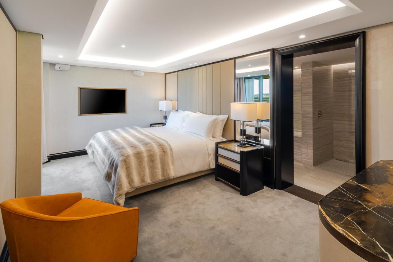 Five Zurich - Luxury City Resort Kültér fotó A bedroom at the hotel