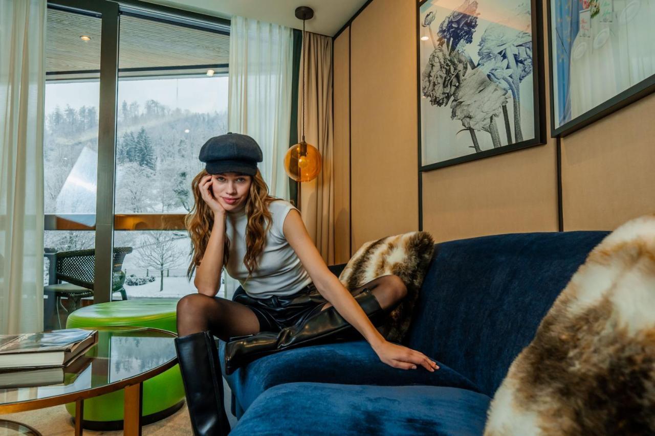 Five Zurich - Luxury City Resort Kültér fotó A woman wearing a leather skirt